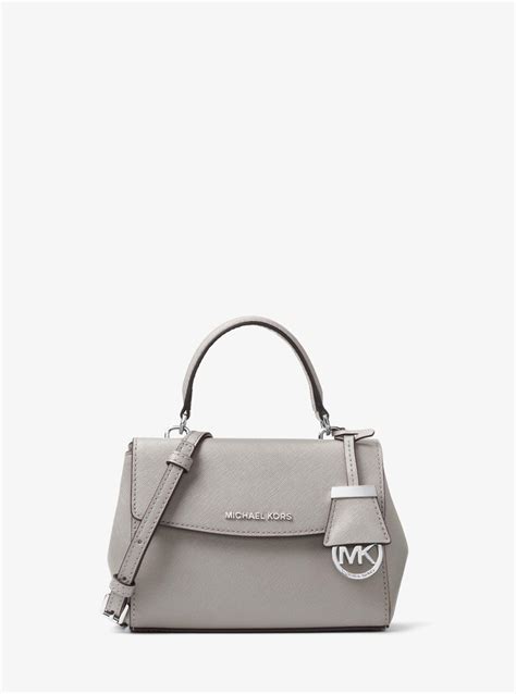 grey Michael Kors purse crossbody